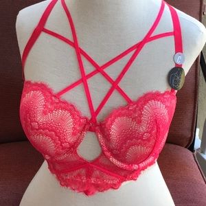 Dark pink bra brand new but have stains.